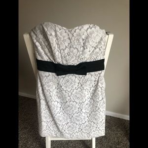 H&M strapless sweetheart dress, size 8, lace overlay with a black bow.